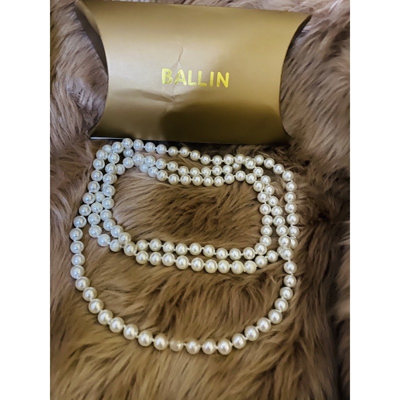 kalung mutiara panjang