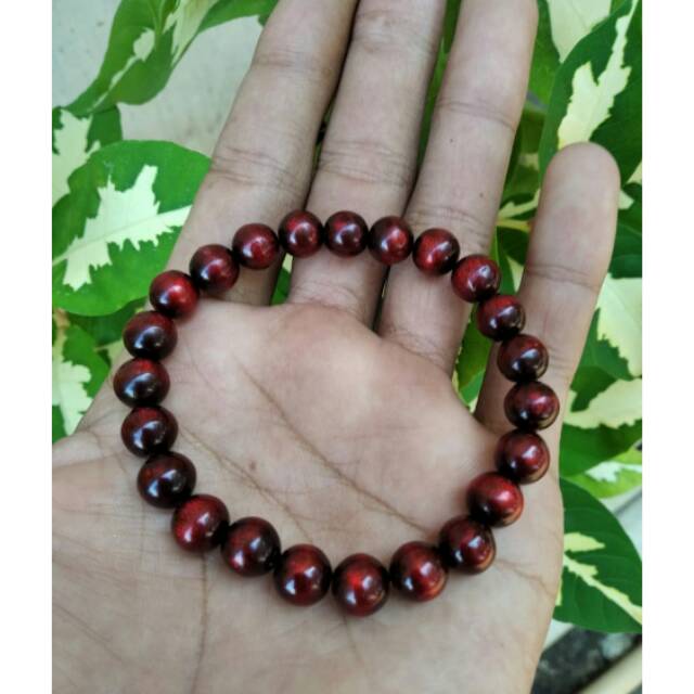 Gelang akar bahar merah delima tembus cahaya