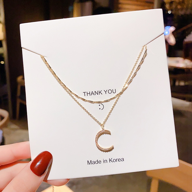 Kalung Choker Liontin Bulan Model Lapis Ganda Bahan Titanium Warna Emas Untuk Wanita