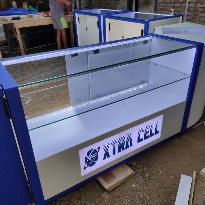 etalase konter hp pulsa modern minimalis