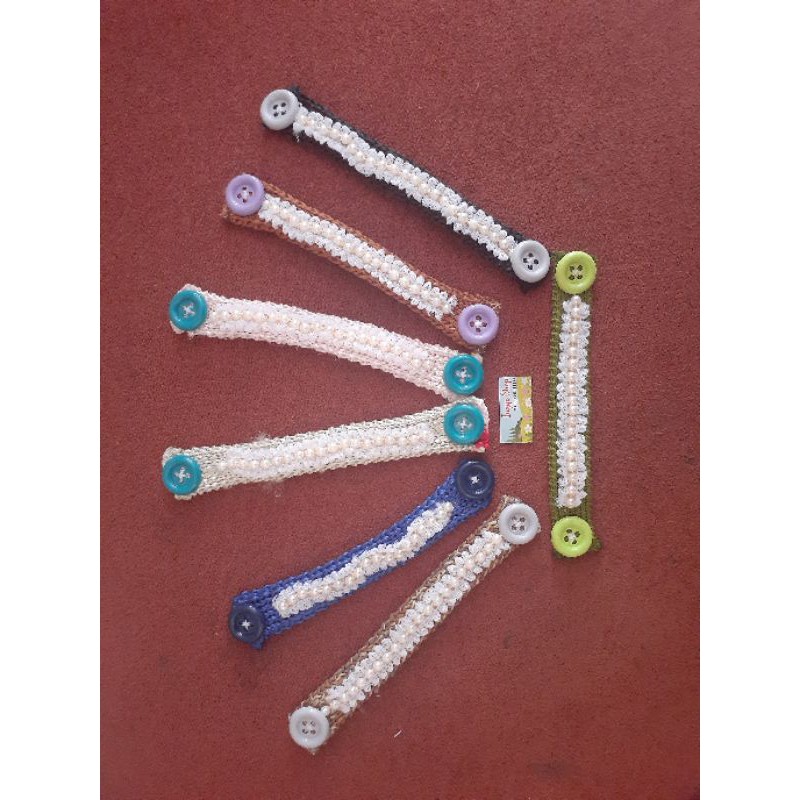 konektor masker rajut mutiara