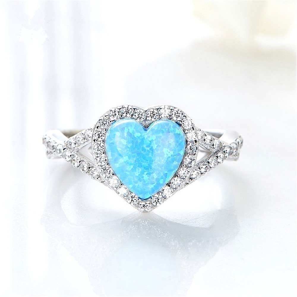 New blue heart-shaped opal inlaid zircon ring