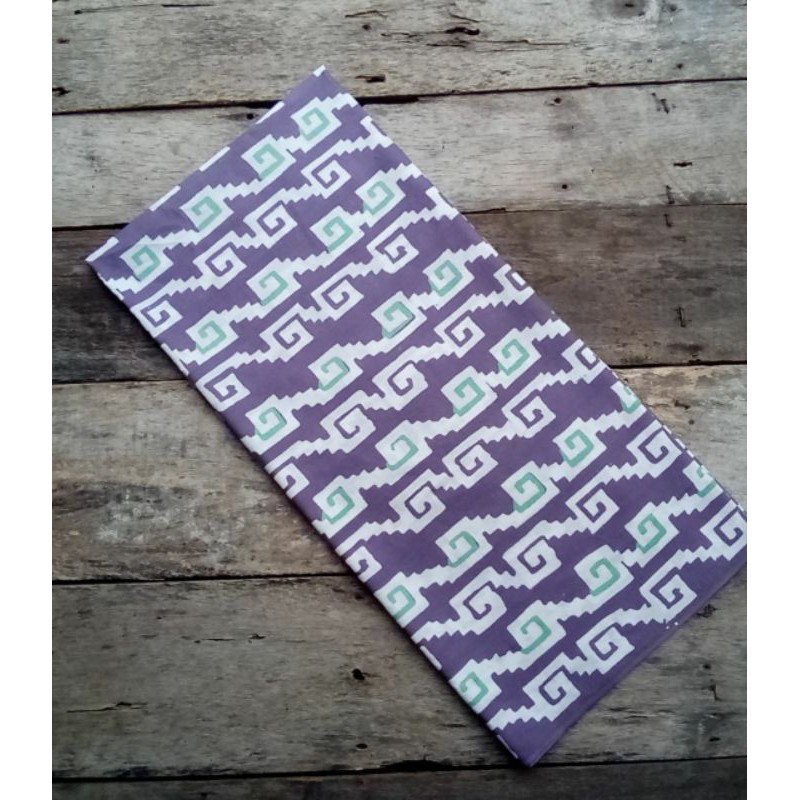 Kain batik cap warna ungu