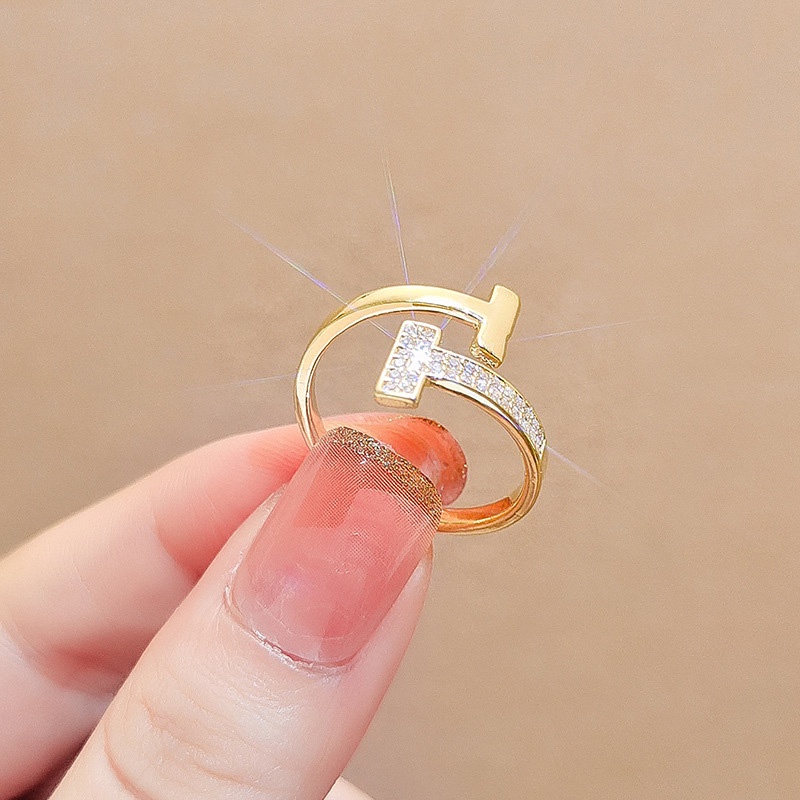 Cincin Model Terbuka Bahan Titanium Steel Warna Gold Desain Tulisan Hias Berlian Adjustable Untuk Wanita