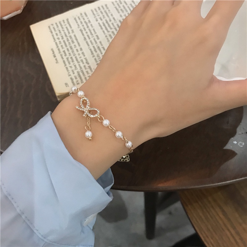 Roselife Gelang Tangan Wanita Desain Pita Hias Kristal Mutiara Gaya Korea Untuk Hadiah
