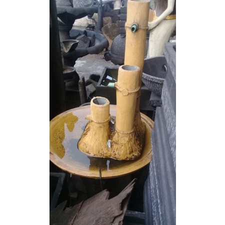 air mancur bambu kuning