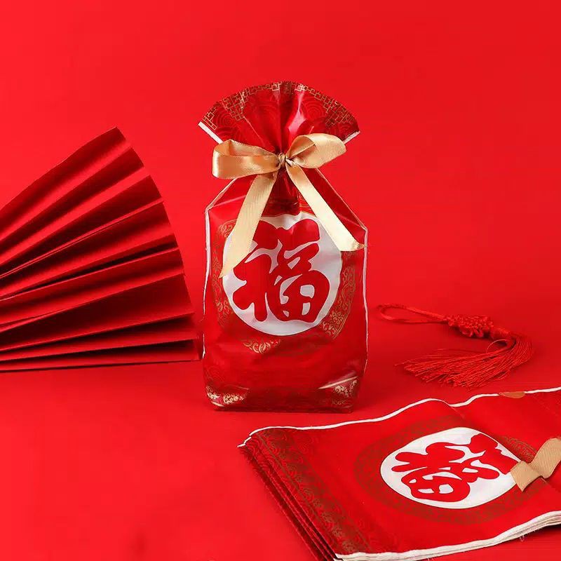 

kantong plastik serut pita imlek fuk/cookies bag hampers/souvenir lucu
