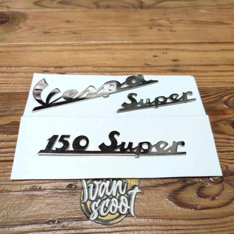 EMBLEM VESPA SUPER LATIN VESPA SUPER 66-73 STAINLESS