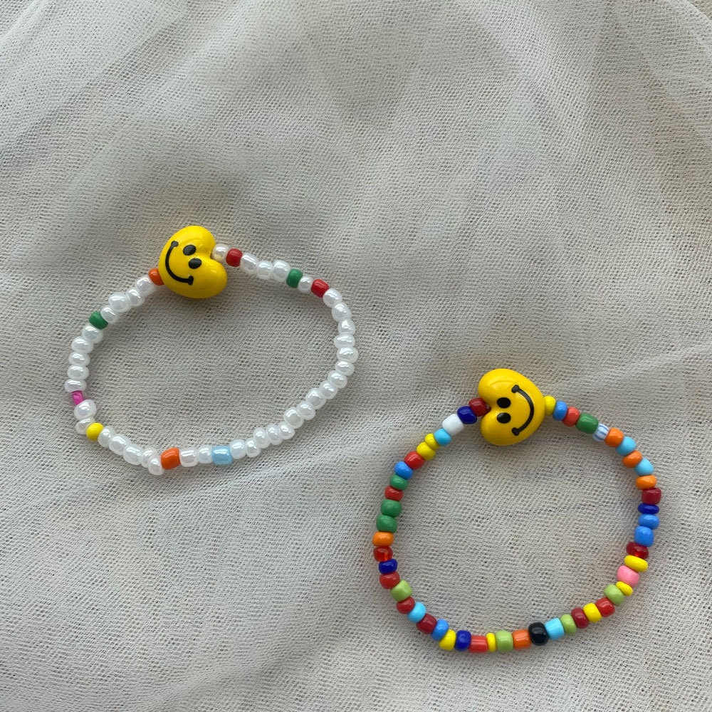 Gelang Tangan Manikmanik Keramik Bulat Motif Smiley Face Handmade Untuk Wanita