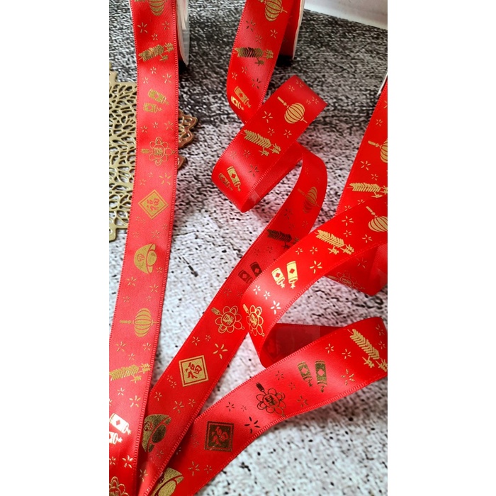 

Pita Hiasan Chinese New Year Imlek / Pita Imlek RedGold 2.5cm