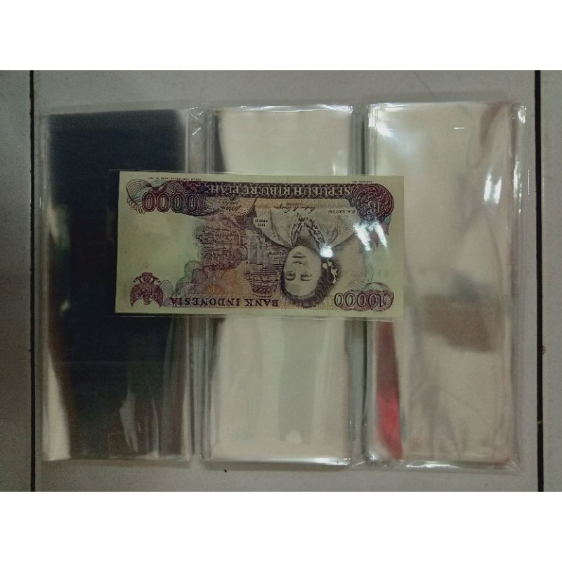 

plastik pelindung uang kuno Indonesia isi 75 lembar ukuran 8x20