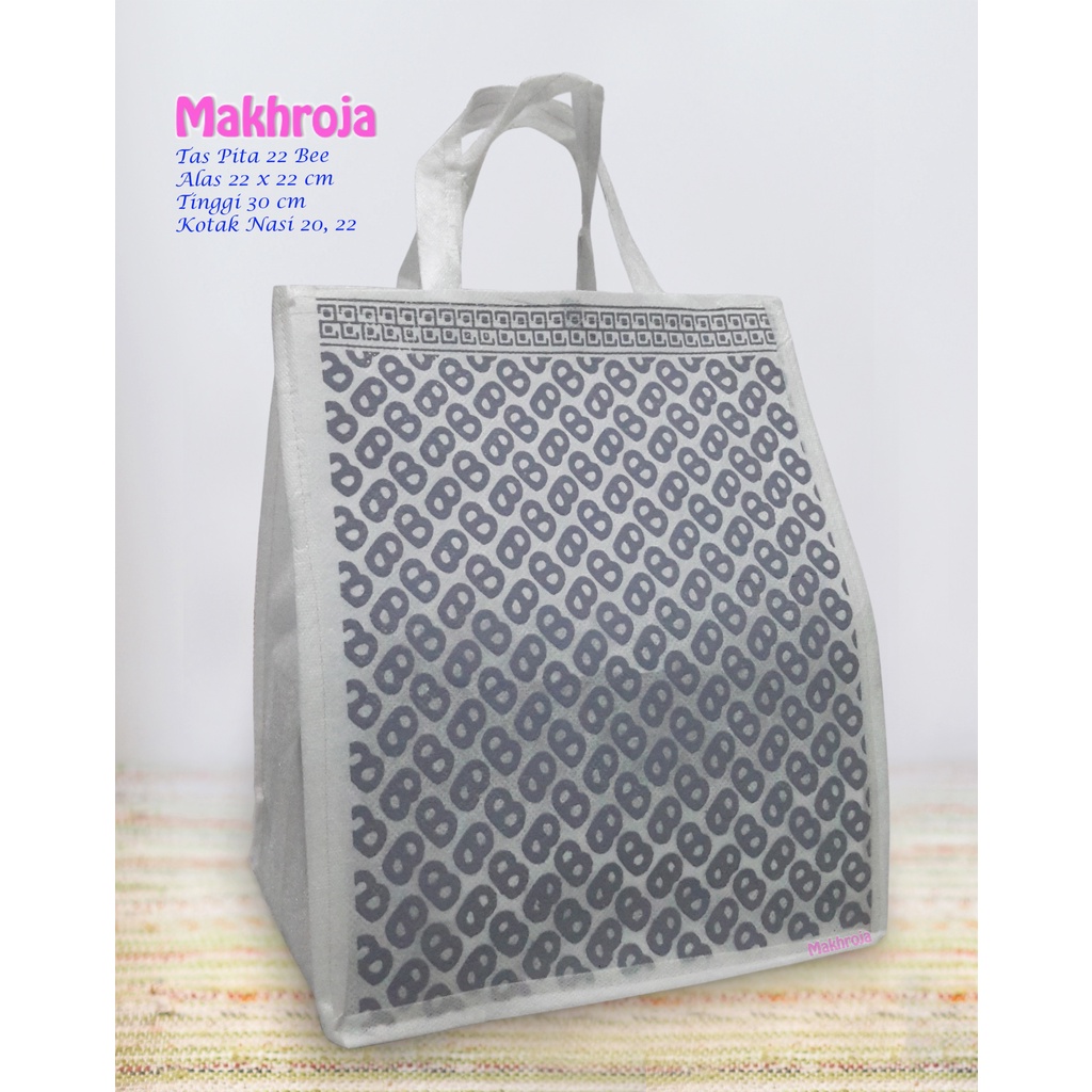 

Tas Hajatan Spunbond Pita 22 Bee Putih Silver
