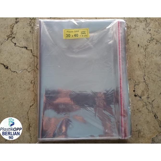 

siap kirim] PLASTIK OPP 30X40 CM TEBAL 20 MIC / PLASTIK BAJU ISI 100 LBR