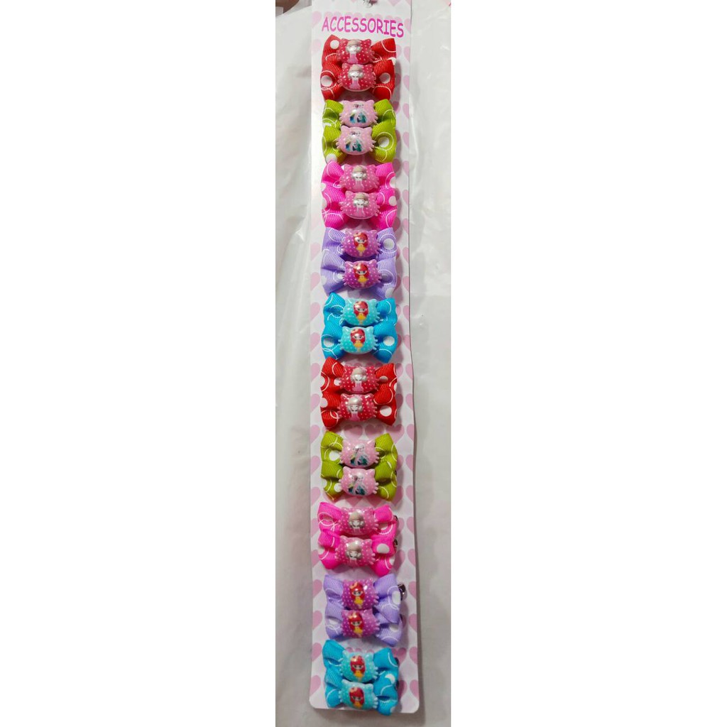 grosir  Jepit pita rambut isi 20 pcs karakter random.