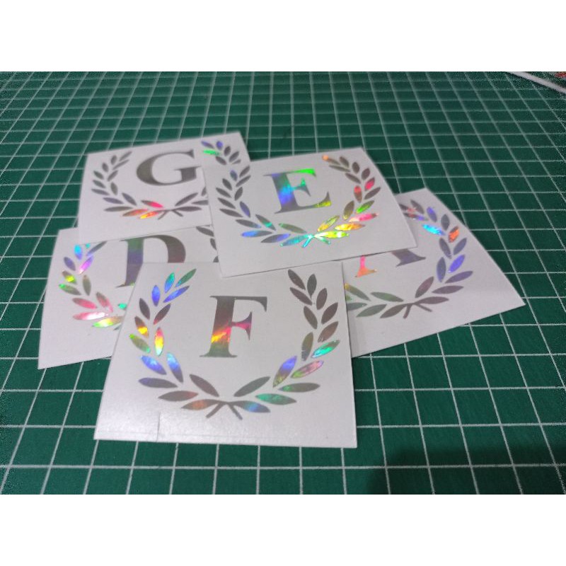 

Stiker Hologram Inisial Nama