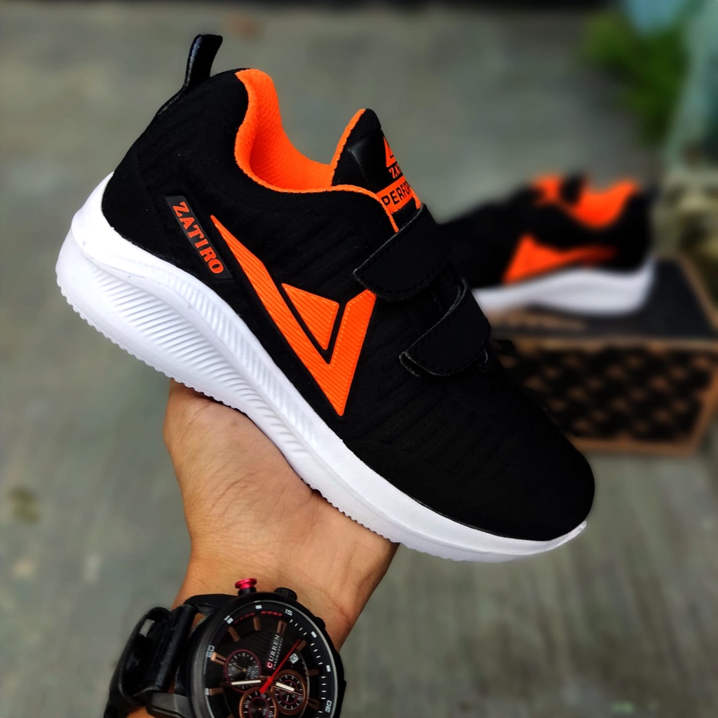 Sepatu Sport Sekolah Sneaker Olahraga Keren Stylish Anak Laki Perempuan Kecil Tanggung Umur TK SD Warna Hitam Rekat Velcro Tanpa Tali Safety