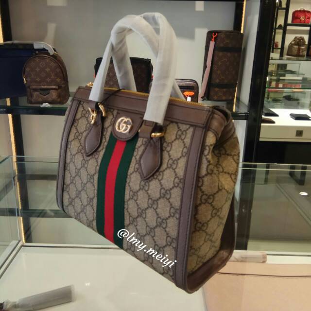 ophidia top handle bag