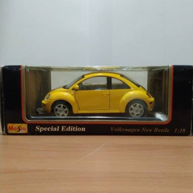 Diecast VW New Bettle Skala 18