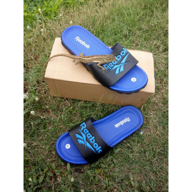 Sandal selop kickers silang garis garis biru