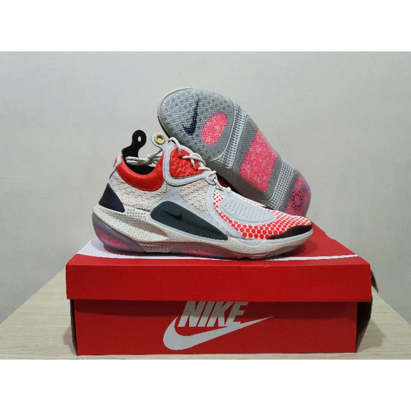 SEPATU SNEAKERS NIKE JOYRIDE NSW SETTER ORANGE BLACK