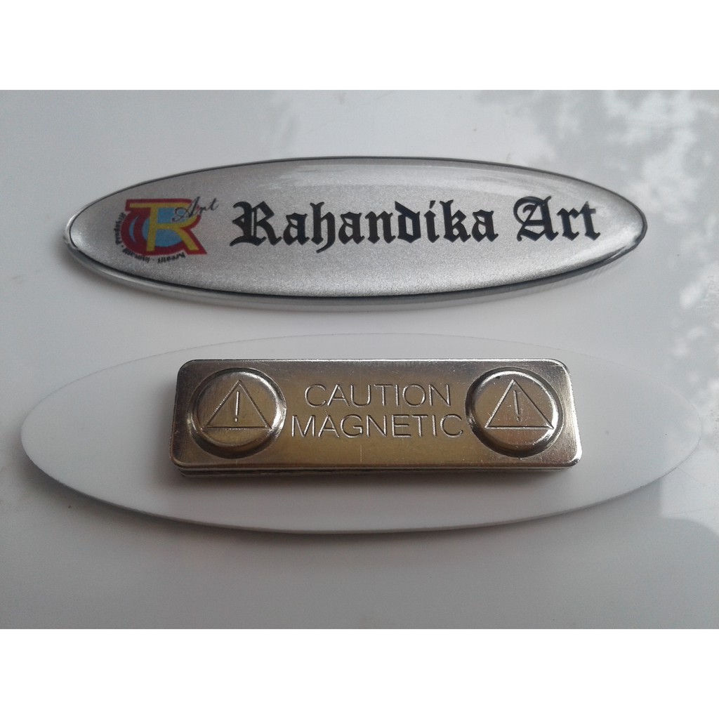 

Name Tage Papan Nama Dada Akrilik Oval Lapis Glass Magnet