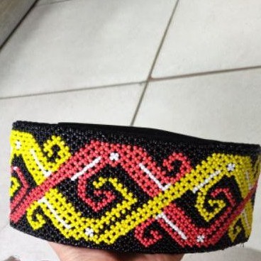 peci manik khas Kalimantan
