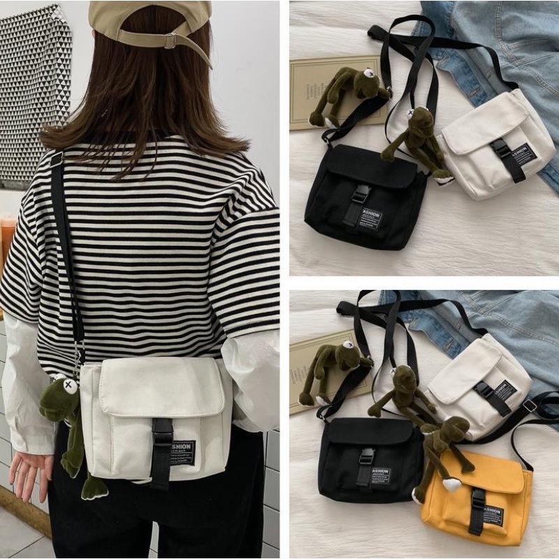 Tas Korea Kasual Sederhana Kipas Sastra Solid Messenger Bag Tas Kanvas Tebal Tas Fashion Pria Wanita Import Korean Casual Simple Literary Fan Solid Messenger Bag Canvas Bag Fashion Bags