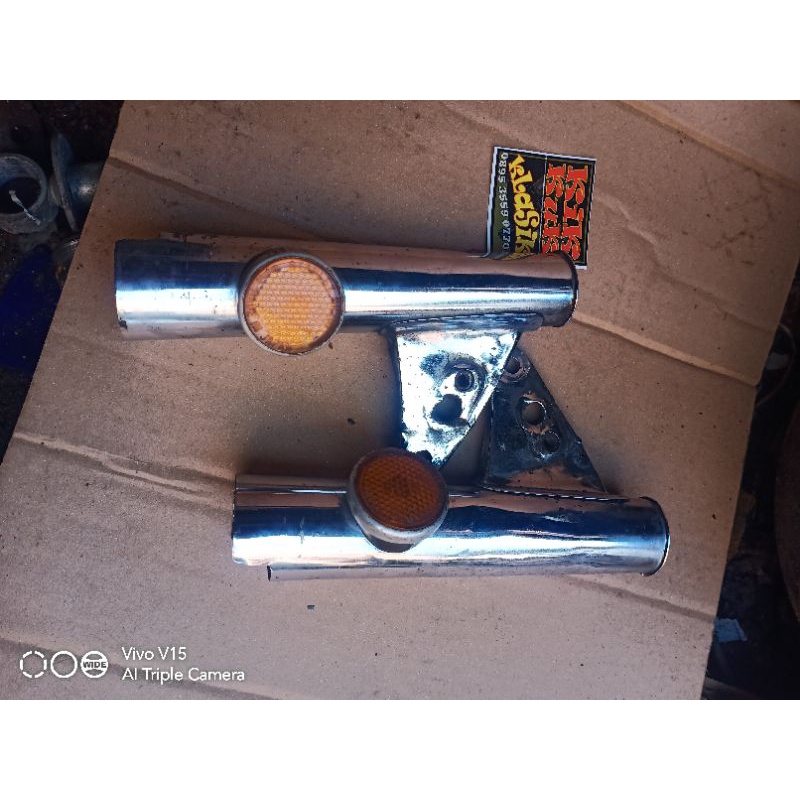 kupingan lampu cb 125 original