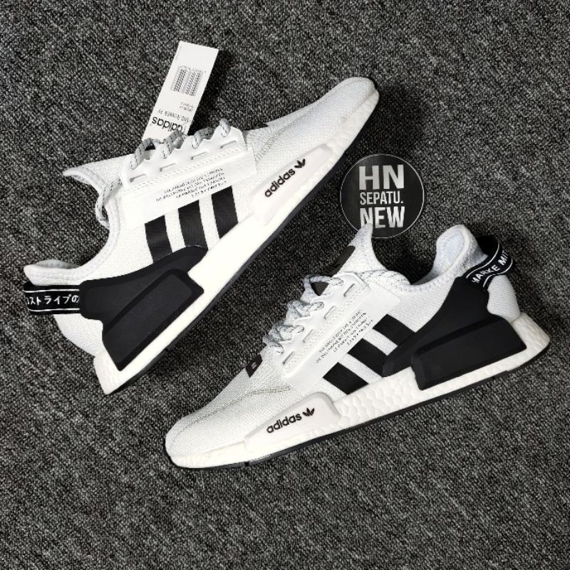 black reflective nmds