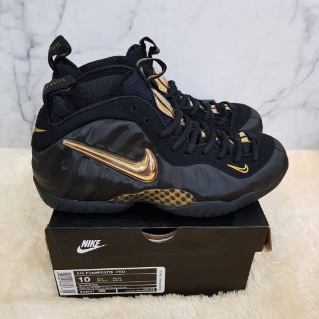 nike foamposite black gold