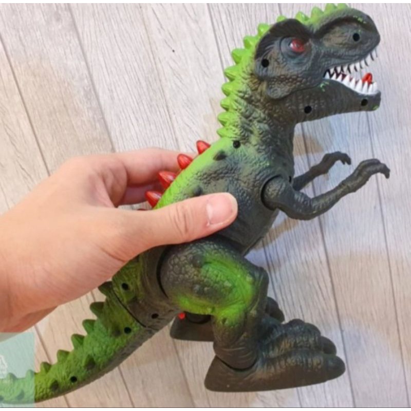 Mainan dinosaurus dengan lampu led dan suara