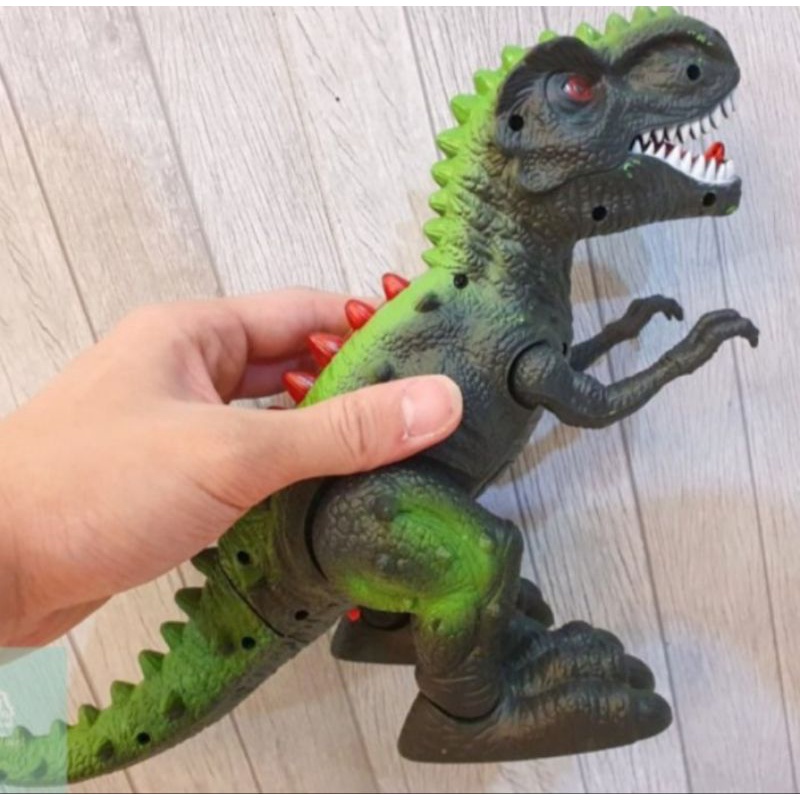 Mainan dinosaurus dengan lampu led dan suara