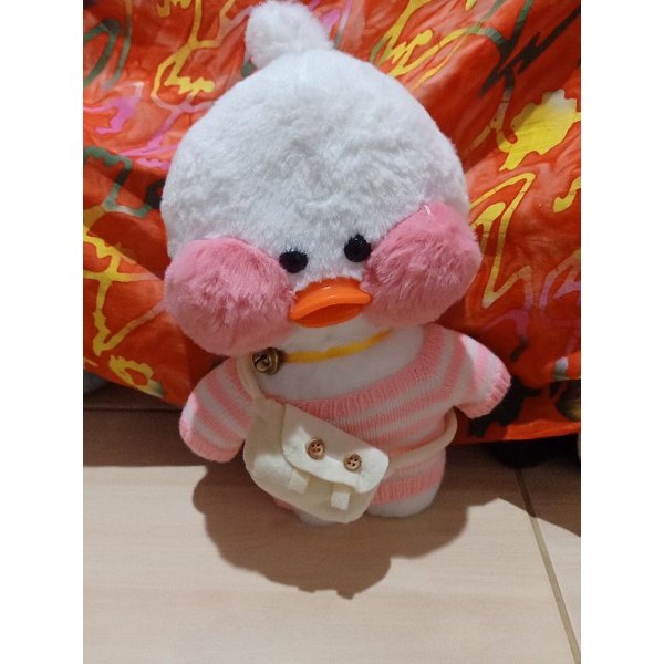 Boneka bebek funfun mulut keras