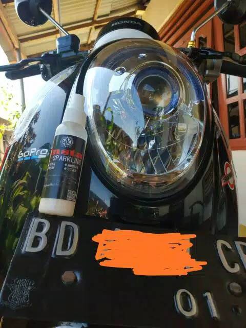 Sparkling pengkilap body motor mobil