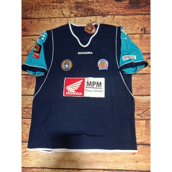 jersey retro arema juara 2009 2010