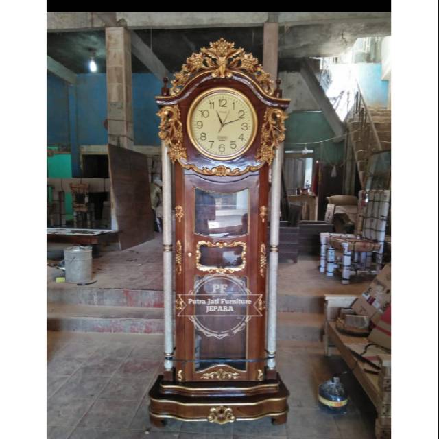 Jam Berdiri Hias Kayu Jati - Jam Masjid Ukir Jepara - Jam Kayu Jati Ukir Warna Kombinasi