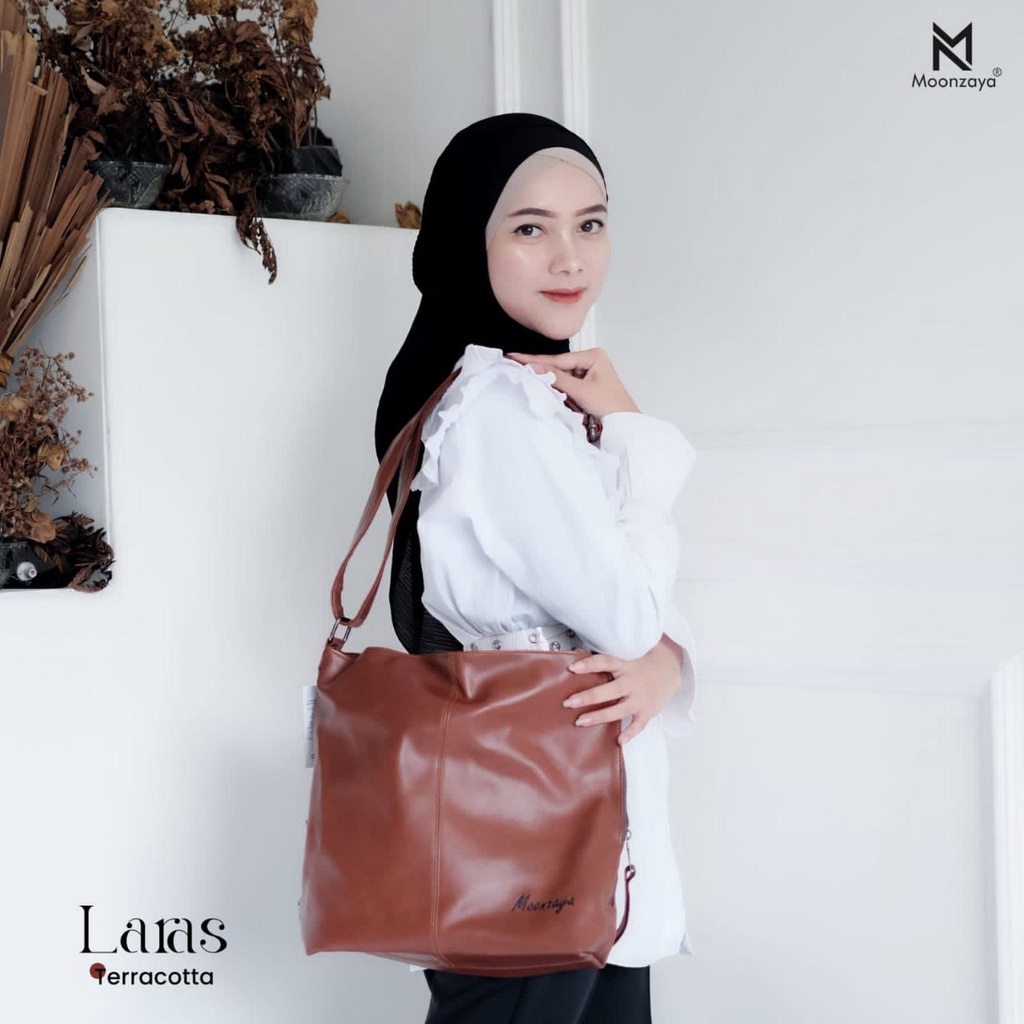 TAS LARAS MOONZAYA