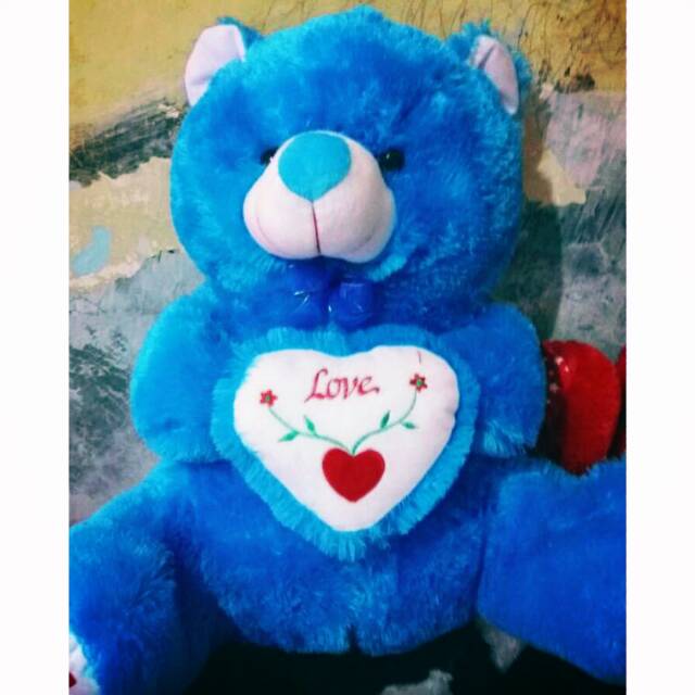 Boneka teddy bear duduk love