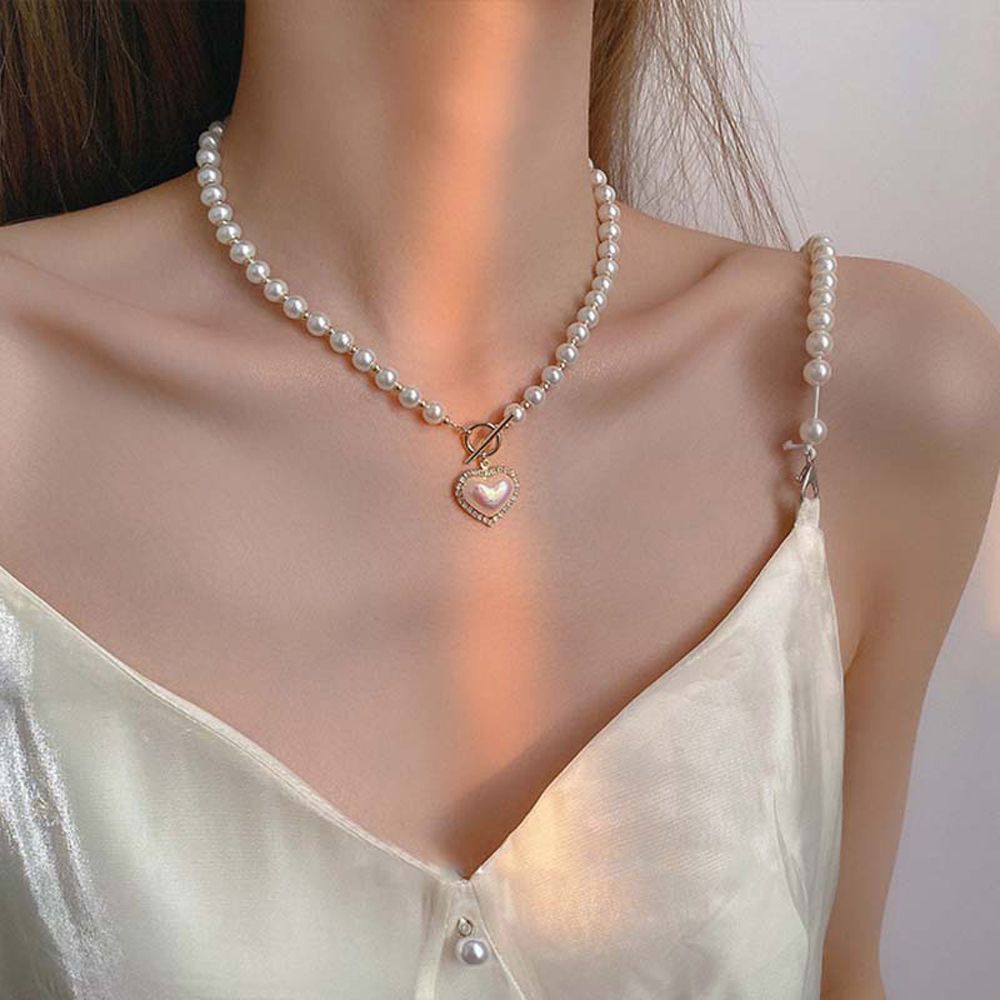 Kalung Choker Rantai Klavikula Bentuk Hati Aksen Mutiara Bahan Alloy Gaya Korea Vintage Untuk Wanita