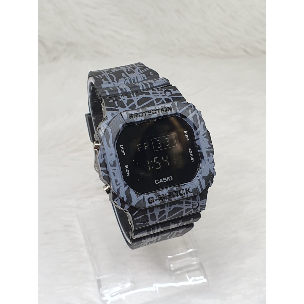 TERLARIS!!!JAM TANGAN PRIA G-SHOCK CASIO DW 5600 GS CASIO SEGI WARNA HITAM ANTI AIR DIGITAL one piece dw bunga dw loreng full hitam best seller ready stock TERIMA COD BAYAR DITEMPAT-TRIBAL HITAM