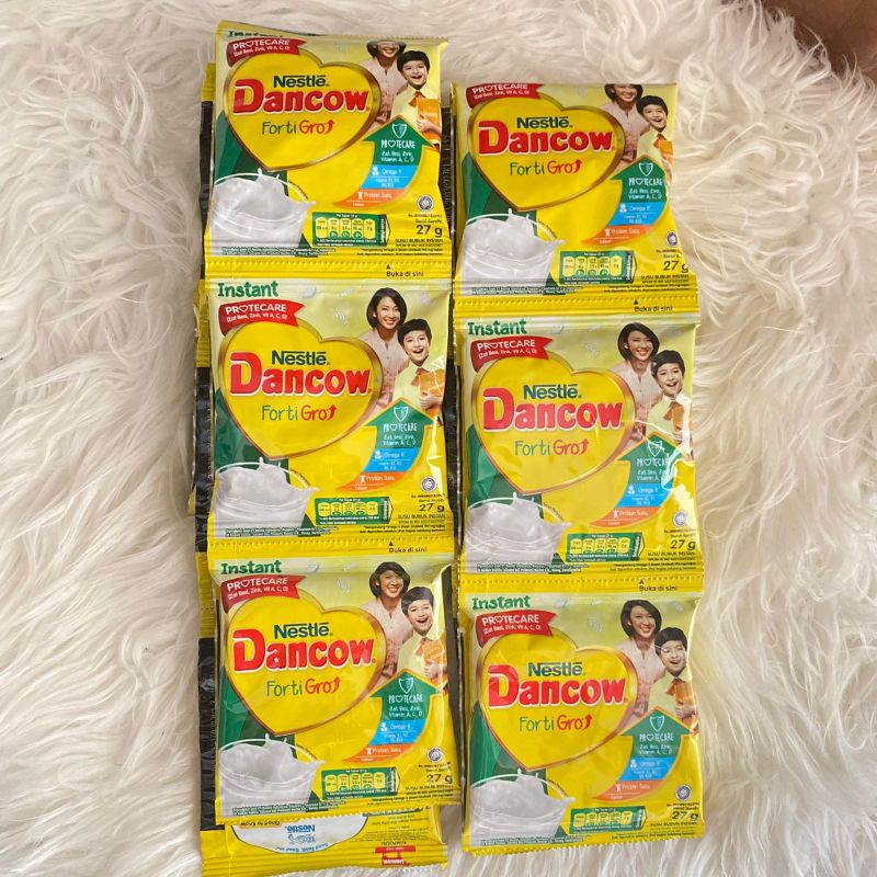 

Dancow instant 27gr 1 renceng isi 10 sachet