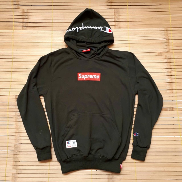 harga hoodie supreme x champion original