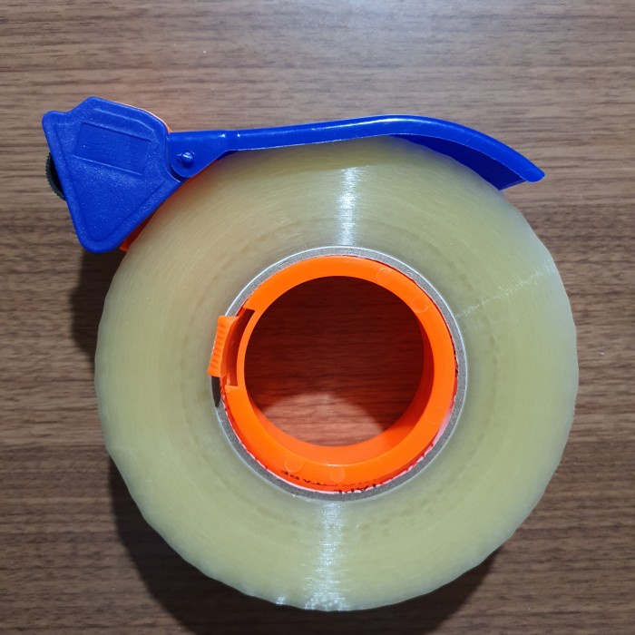 

perekat-pengikat- dispenser tape cutter / pemotong lakban 2” elastis tajam. promo!! -pengikat-