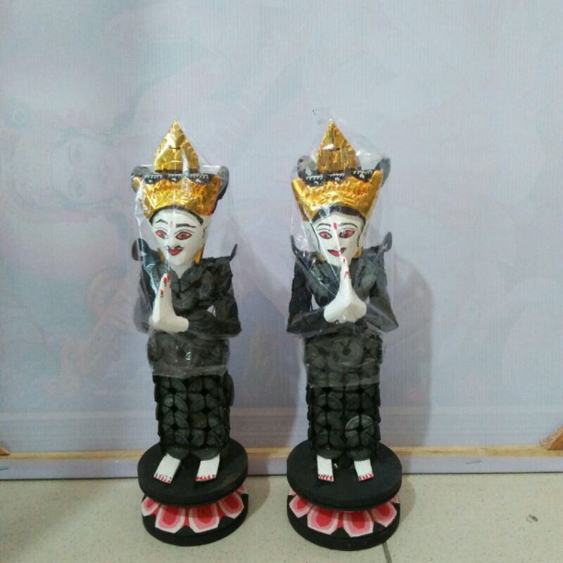 Patung Sri Rambut sedana uang kepeng