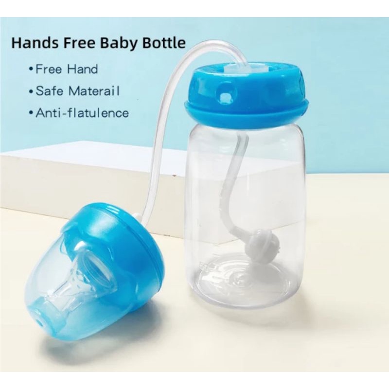 Hands free feeding bottle. Botol susu bayi bebas genggam.