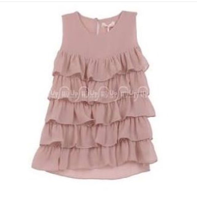 Ruffle dress by Ria Miranda Kids