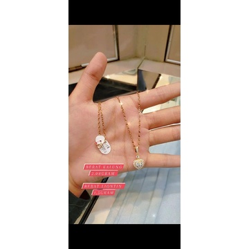 kalung dan liontin mata bulat