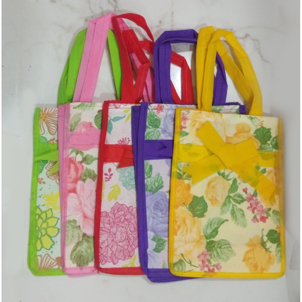 

TAS KANTONG SPUNBOND / GOODIE BAG MOTIF