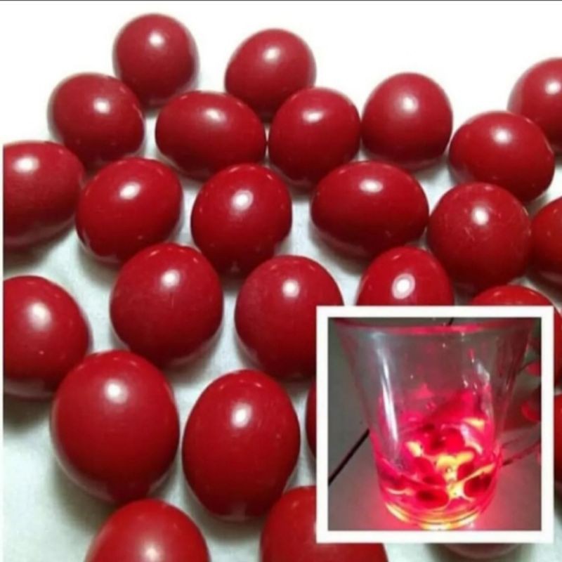 Batu Merah Delima Menyala di dalam air