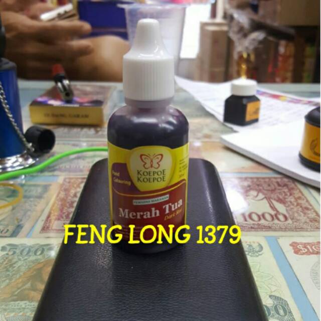

Tinta Merah Tua Cap Kupu Kupu